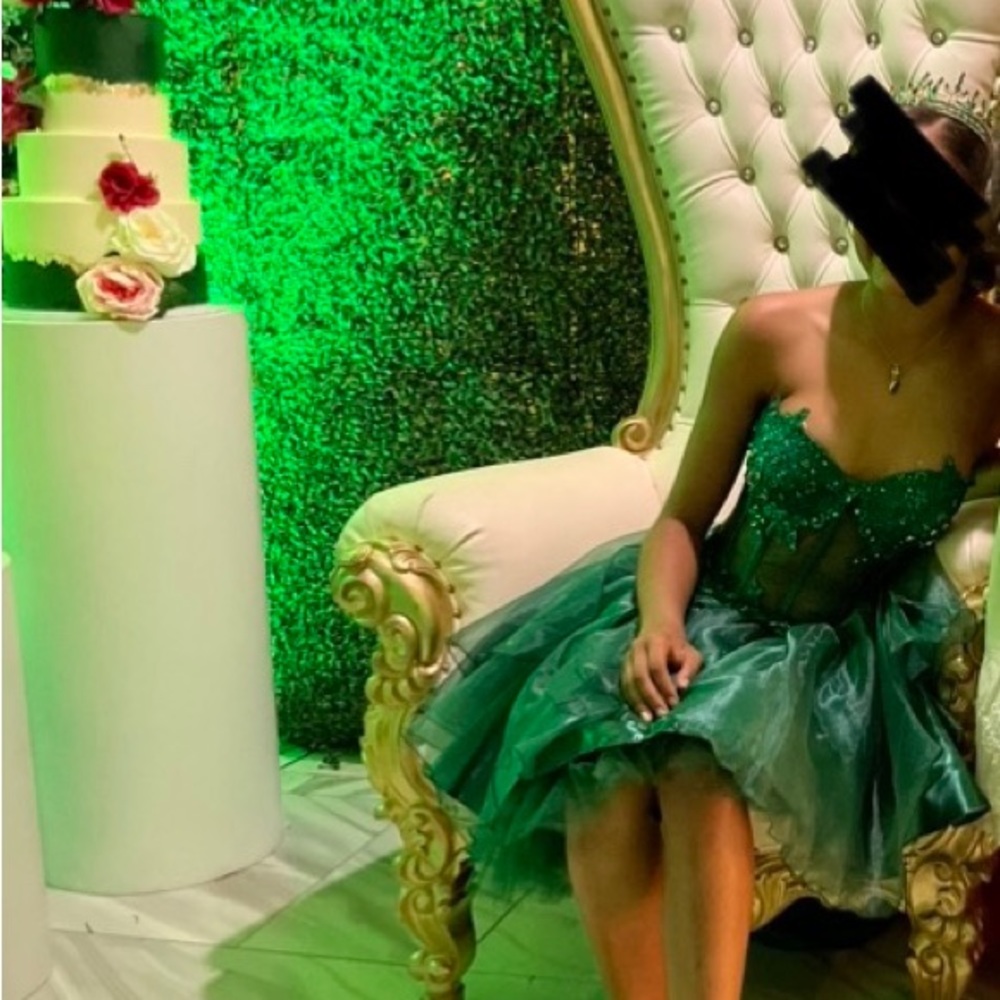 Custom emerald green dress with detachable ball gown skirt and sheer cape